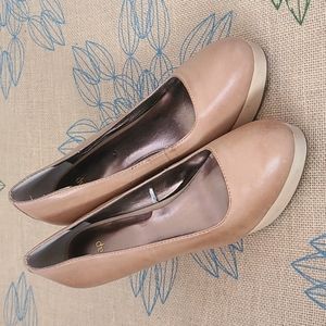 Tan wood and leather platforms